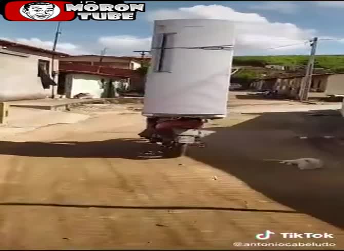 Video :Using your motorbike while carrying a refrigerator